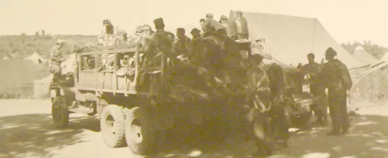 Flight crews boarding trucks after the briefing. Photo by Quentin Kaiser.