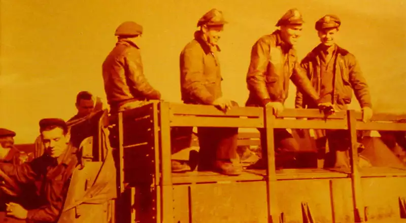 Fitch and others in a truck. Photo by Quentin Kaiser.