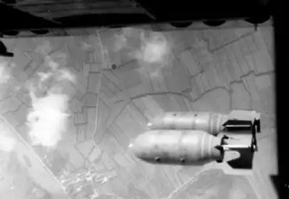 Two 1000 pounders, just released, heading for the target on a mission.