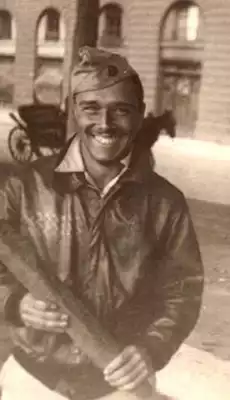 Quentin Kaiser in Lyon, France after the Liberation with 'real' French bread.