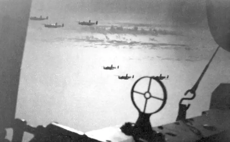 A box of six B-25s as seen through his gunsight- photograph by Quentin Kaiser.