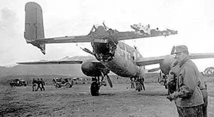B-25 8P with tail damage from a mid-air collision.