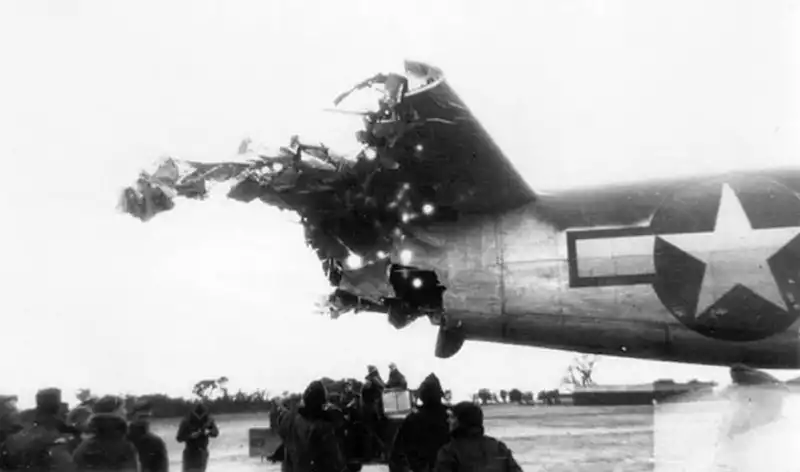 B-25 8P with tail damage from a mid-air collision.