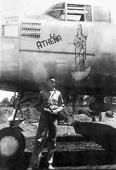 Eddie Little standing next to his plane B-25J 9M 'Athena.'