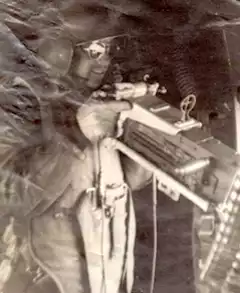 Quentin manning one of his 50-Calber machine guns.