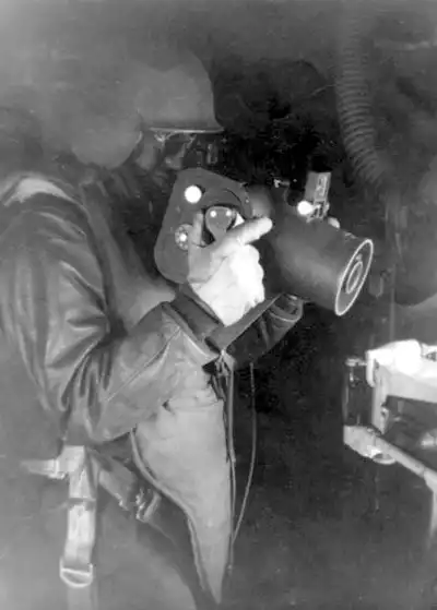 Quentin with camera often used on missions.