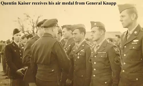 Quentin Kaiser receives his air medal from General Knapp.