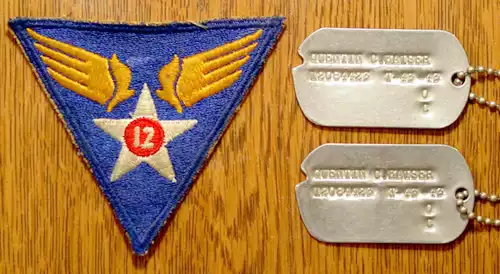 My Dad's 12th Air Force shoulder patch and dog tags.