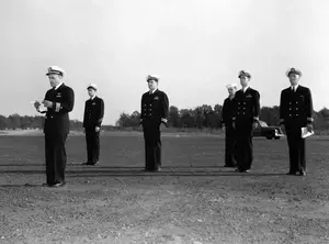 Change Of Command LCDR Pear reads his orders October 31, 1944