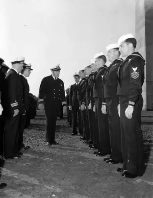 LCDR Bolam inspecting ships company October 31, 1944