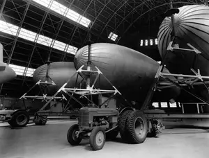 Tow tractor with blimps in Hangar 1 September 23, 1945