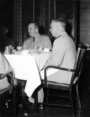 VADM_Adolphus_Andrews_With_CAPT Fisher As Host Dines at SoWey OCLub September 2, 1943